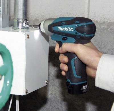 Аккумуляторный ударный шуруповерт Makita TD090DWE (TD 090 DWE) - вид 1 миниатюра